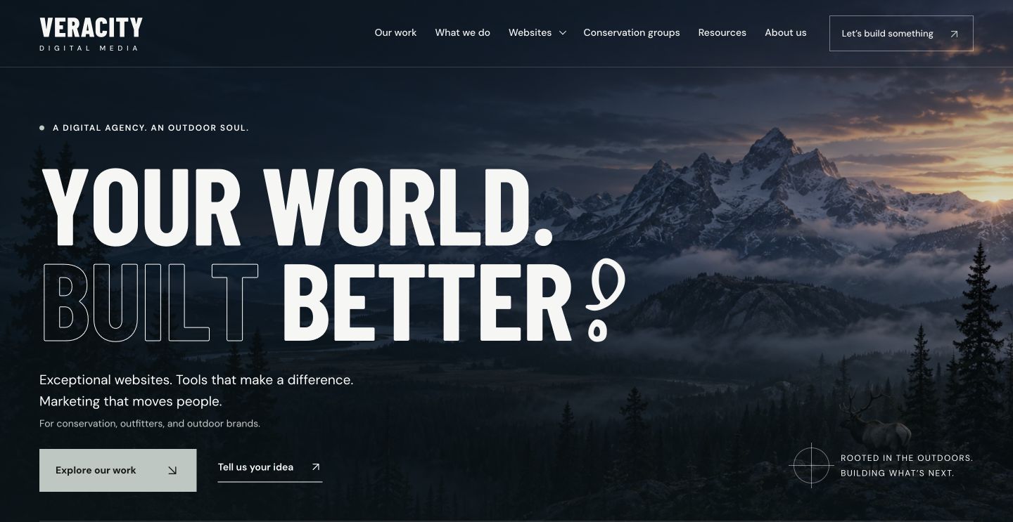 Current Veracity Digital Media homepage with a mountain landscape and the message Your World. Built Better.